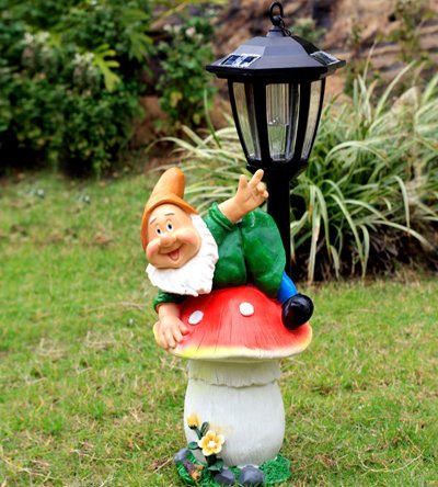 Gnome on mushroom with Lamp