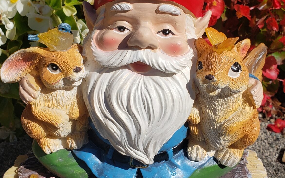 Garden Gnome on Welcome Sign with Rabbits - The Gnome Shop